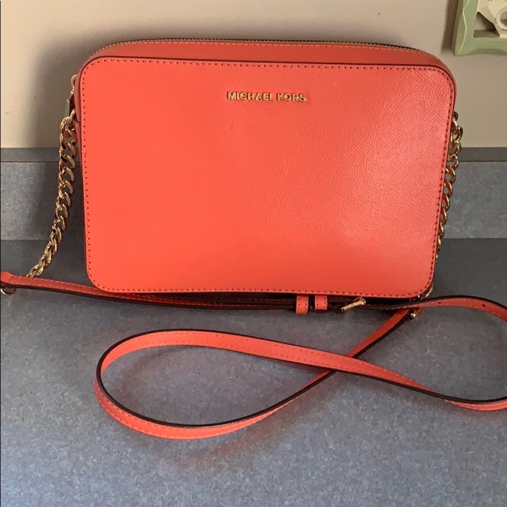 Mk coral cross body